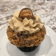 Butterfingers Cupcake: Chocolate cupcake with peanut butter buttercream, topped with Butterfinger candy