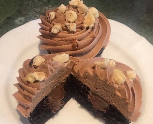 Hazelnut Hermit Cupcake: Chocolate cupcake with Nutella filling, Nutella buttercream and chopped hazelnuts