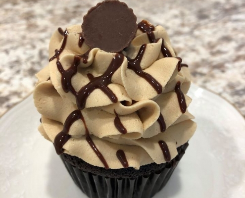 PB Party Cupcake: Chocolate cupcake with peanut butter buttercream, chocolate ganache drizzle and a mini peanut butter cup