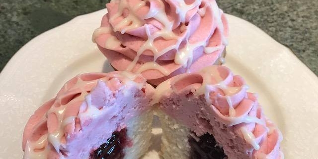 Sugarloaf Swirl Cupcake: Vanilla cupcake with raspberry filling, raspberry buttercream and a raspberry