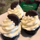 Thin Mints Cupcakes: Chocolate cupcake baked with cookie pieces with mint buttercream and a cookie