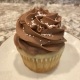 Acadia's Friend Cupcake: Vanilla bean cupcake with chocolate buttercream and white sprinkles