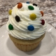 Birthday Party Cupcake: Yellow cupcake with vanilla buttercream and mini M&Ms