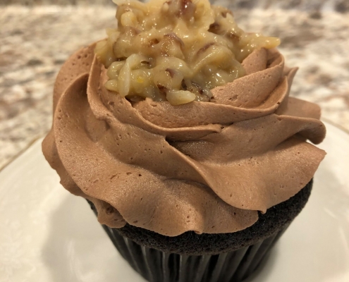 German Cake Cupcake: Chocolate cupcake with coconut pecan filling and chocolate buttercream