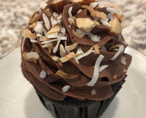 Grammie's Goody Cupcake: Chocolate cupcake with dark chocolate buttercream, toasted coconut and chopped almonds