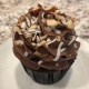 Grammie's Goody Cupcake: Chocolate cupcake with dark chocolate buttercream, toasted coconut and chopped almonds