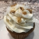 Grandpa's Classic Cupcake: Oatmeal cupcake with brown sugar cream cheese buttercream, coconut and chopped walnuts