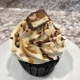 Snitger Sweet Cupcake: Chocolate cupcake with caramel buttercream, chocolate ganache and caramel sauce drizzle, chopped peanuts and a Snickers candy bar slice