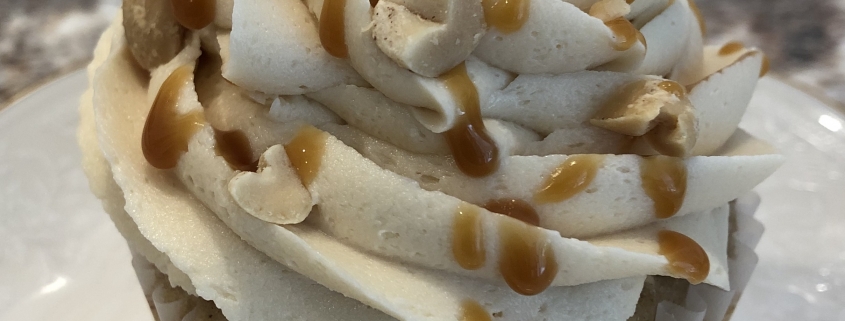 Caramel Apple Cupcake: Apple spice cupcake with salted caramel buttercream, caramel sauce drizzle and chopped peanuts (nuts optional)