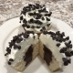 Chocolate Chip Charm Cupcake: Vanilla cupcake with chocolate ganache filling, vanilla buttercream and mini chocolate chips