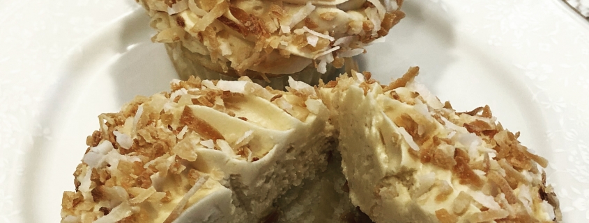 Coconut Carnival Cupcake: Coconut cupcake with dulce de leche filling with dulce de leche buttercream and toasted coconut