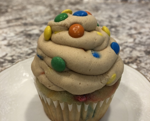 PB Chickadee Cupcake: M&M cupcake with peanut butter M&M buttercream and mini M&Ms