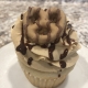 Pine Point PB Cupcake: Vanilla cupcake with peanut butter buttercream, chocolate ganache drizzle and a Reese's peanut butter dipped pretzel