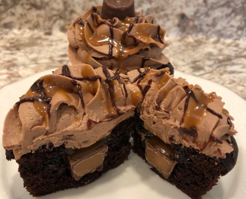 Cumberland Caramel Cupcake: Chocolate cupcake filled with a Rolo and caramel sauce, chocolate buttercream, chocolate ganache and caramel sauce drizzle and a Rolo