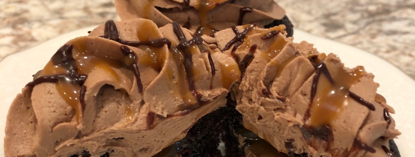 Cumberland Caramel Cupcake: Chocolate cupcake filled with a Rolo and caramel sauce, chocolate buttercream, chocolate ganache and caramel sauce drizzle and a Rolo