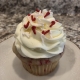 Candy Cane Cupcake: Vanilla red Funfetti cupcake with peppermint buttercream and candy cane sprinkles