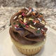 Childhood Classic Cupcake: Yellow cupcake with chocolate buttercream and rainbow sprinkles