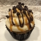 Casco Bay Caramel Chip Cupcake: Caramel chocolate chip cupcake with salted caramel buttercream, chocolate ganache drizzle, caramel sauce drizzle and mini chocolate chips