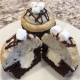 S'moreo Cupcake: Chocolate cupcake with marshmallow filling, cookies-n-creme buttercream, graham cracker crumbs, chocolate ganache drizzle, Oreo cookie and mini marshmallows
