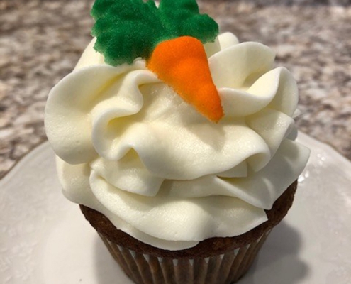 Cottontail Cupcake: Carrot cupcake with cream cheese buttercream and a candy carrot