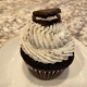 Cookie Monster Cupcake: Chocolate cupcake with cookies-n-creme buttercream, topped with a chocolate covered Oreo