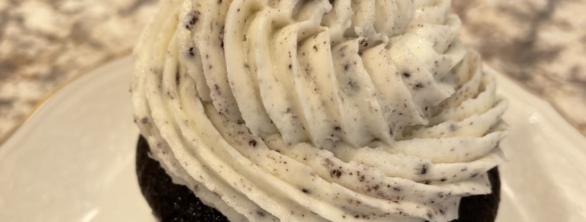 Cookie Monster Cupcake: Chocolate cupcake with cookies-n-creme buttercream, topped with a chocolate covered Oreo