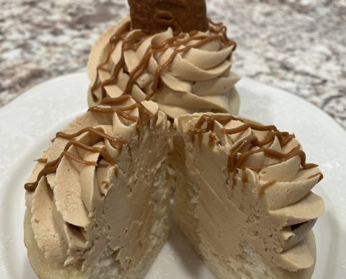 The Beachcomber Cupcake: Vanilla cupcake filled and frosted with Cookie Butter buttercream, cookie butter drizzle and a Biscoff cookie
