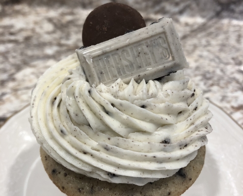 Orono Oreo Cupcake: Cookies-n-creme cupcake with cookies-n-creme buttercream and a mini chocolate covered Oreo