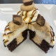 Slice of Heaven Cupcake: Chocolate cupcake with peanut butter buttercream filling, cream cheese buttercream, caramel sauce and chocolate ganache drizzle and a peanut butter cup