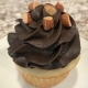 Almond Affair Cupcake: Almond cupcake with dark chocolate buttercream and chopped almonds